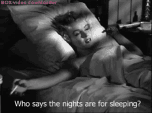 a woman laying in bed with the words who says the nights are for sleeping on the bottom