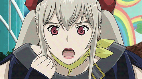 a girl with a yellow scarf around her neck looks surprised