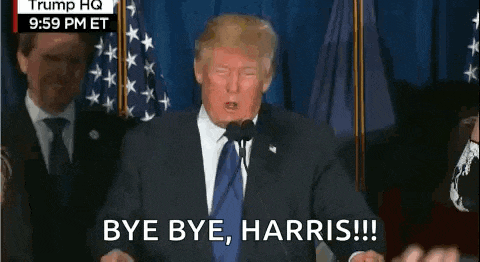 donald trump is giving a speech in front of a microphone and says `` bye bye , harris '' .