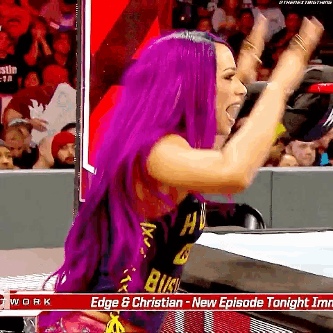 a woman with purple hair is standing in front of a sign that says edge & christian on it