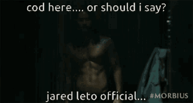 a shirtless man stands in a dark room with the caption cod here or should i say