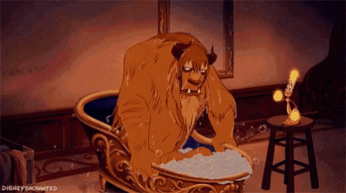 the beast from beauty and the beast is taking a bath in a tub