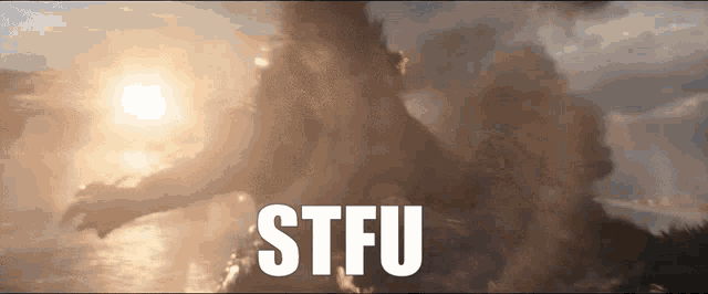 the word stfu is on a cloudy background