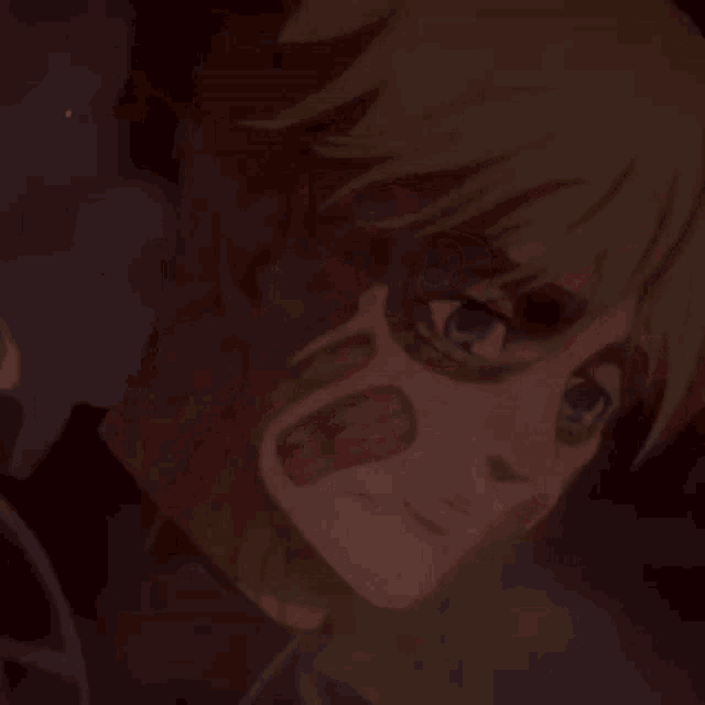 a close up of a person 's face in a dark room with a huge mouth .