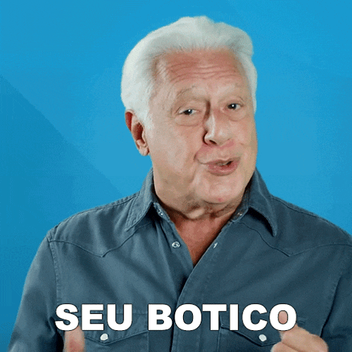 a man in a blue shirt is giving a thumbs up and says seu botico