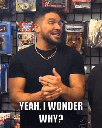 a man in a black shirt says " yeah i wonder why " in front of a wall of toys