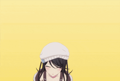 a girl wearing a white hat with a sticker that says ' sn ' on it