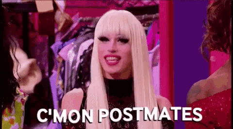 a drag queen with blonde hair is standing in front of a closet and says `` c mon postmates '' .