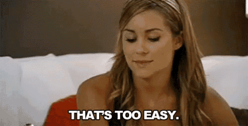 a woman is sitting on a couch with her eyes closed and saying `` that 's too easy . ''