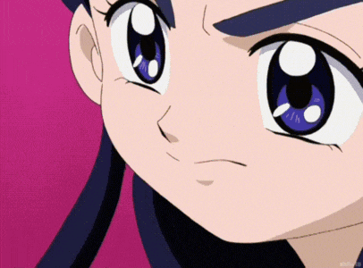 a close up of a cartoon character 's face with a pink background