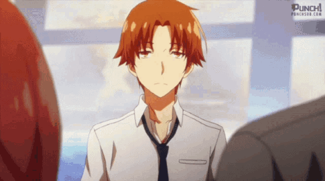 a man with red hair is wearing a white shirt and a tie .