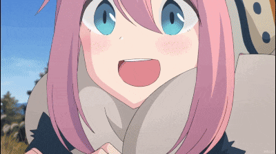 a girl with pink hair and blue eyes is smiling and wearing a scarf around her neck