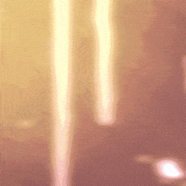 a blurred image of a purple and yellow background