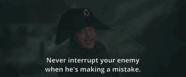 a man in a napoleon hat with the words " never interrupt your enemy when he 's making a mistake "