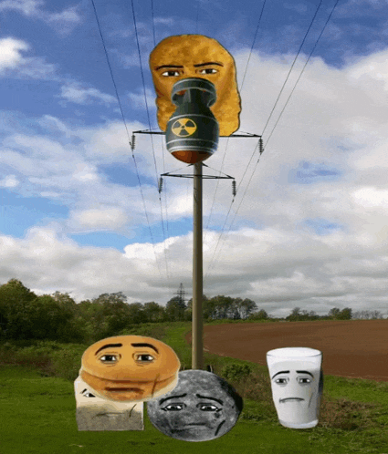 a bunch of faces are painted on a pole including a nuclear bomb
