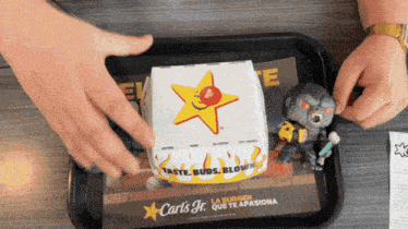 a carl 's jr. hamburger box with a star on it