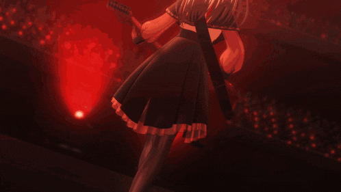 a close up of a person holding a guitar with the letters cc on it