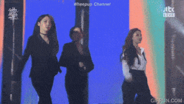 three women are dancing on a stage with the words wheepup channel written above them