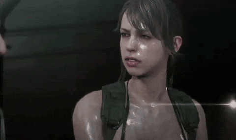 a close up of a woman 's face with sweat coming out of her face .