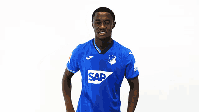 a man in a blue shirt with the word sap on the front