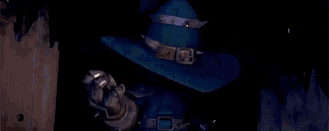 a cartoon character in a blue hat with yellow eyes is holding a sword