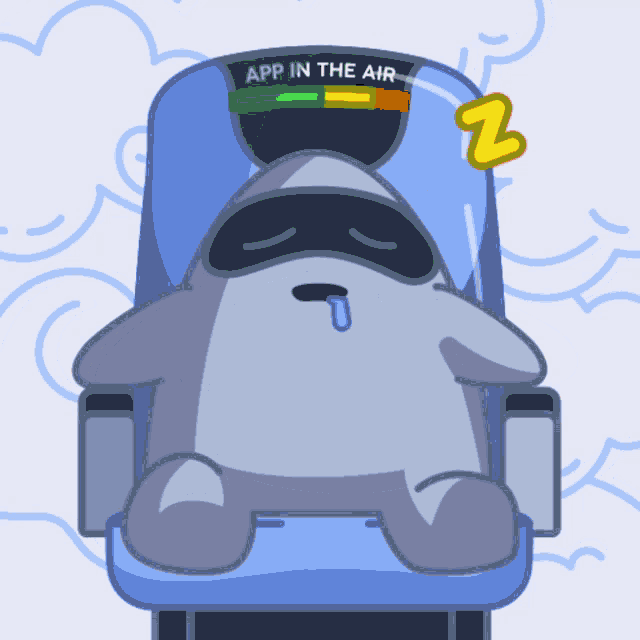 a cartoon of a shark sleeping in a chair with the words app in the air on it