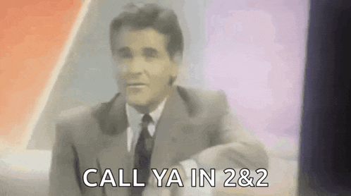 a man in a suit and tie is saying `` call ya in 2 and 2 '' .