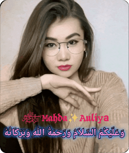 a picture of a woman with glasses and the name mahda auliya on it