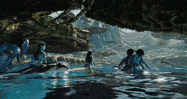 a group of avatar people are swimming in a lake