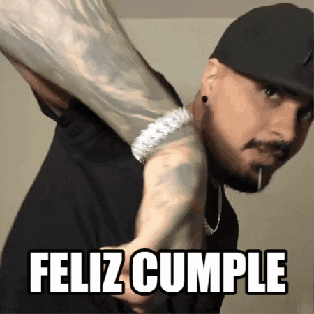 a man is holding a large object over his shoulder with the words feliz cumple written on the bottom