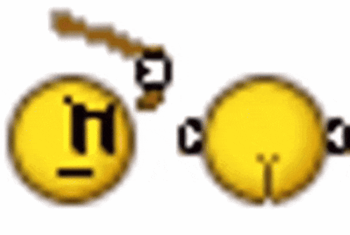 a couple of smiley faces are standing next to each other on a white surface .