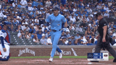 a baseball game is being played with a jim beam ad in the outfield