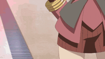 a girl in a pink skirt is standing next to a striped wall