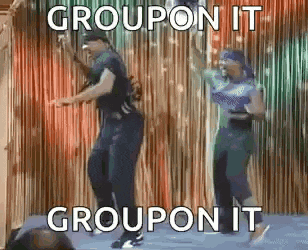 a man and a woman are dancing on a stage with the words groupon it groupon it written on the bottom .