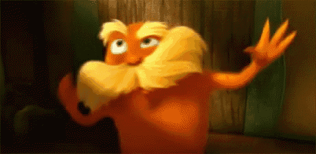 a close up of a cartoon character with a beard waving .