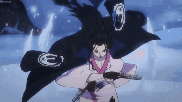 a woman in a kimono is holding a gun with the letter e on her sleeve