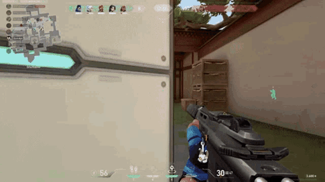 a person is holding a gun in a video game with a score of 30