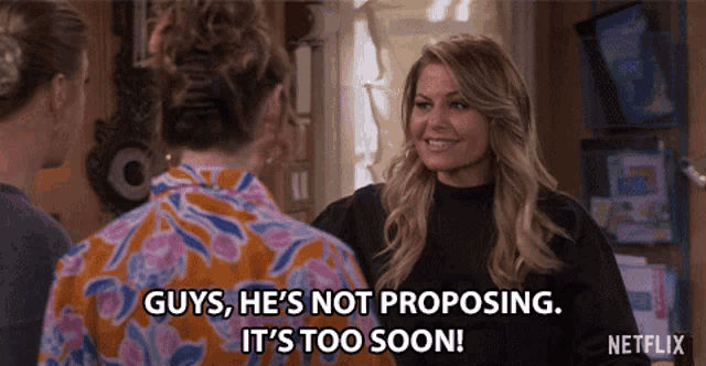 a woman says " guys he 's not proposing it 's too soon " in a netflix ad