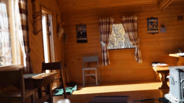 a wooden room with a calendar on the wall that says " finland "