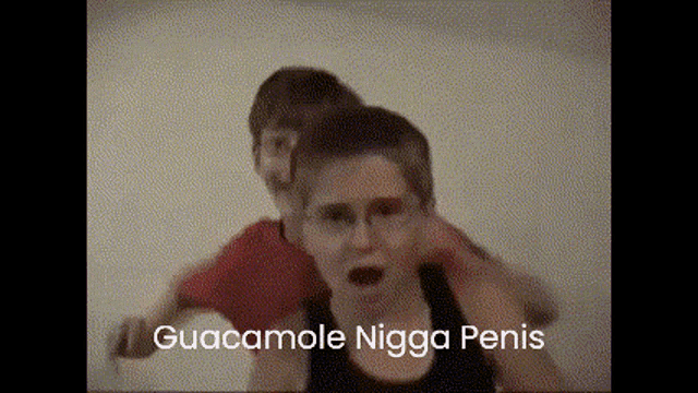 a woman is carrying a child on her shoulders and the words guacamole nigga penis are on the bottom