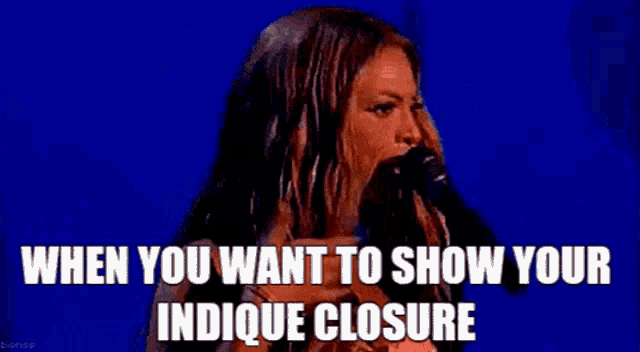 a woman is standing in front of a microphone with the words `` when you want to show your indicque closure '' .