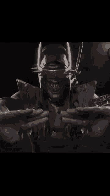 a statue of a man with a sword and a mask on his face