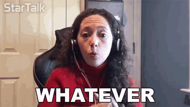 a woman wearing headphones is making a funny face and saying whatever