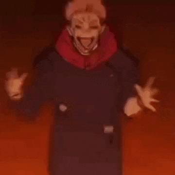 a man with a scarf around his neck is standing in the dark with his hands folded in prayer .