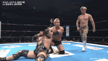 a wrestling match with the hashtag #njpvsnoah on the bottom right