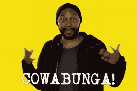a man with a beard is standing in front of a yellow background and says cowabunga