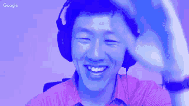 a man wearing headphones is smiling in a google ad
