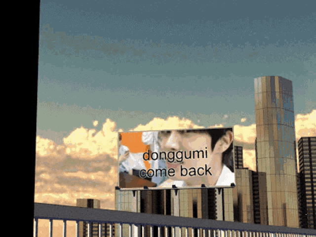 a billboard says donggumi come back on it