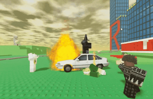 a white car is on fire in a video game with a building in the background with the letter r on it