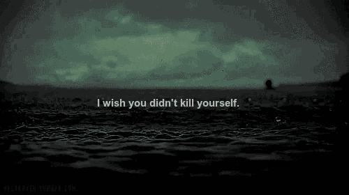 a person is swimming in the ocean with the words `` i wish you did n't kill yourself '' written on the water .
